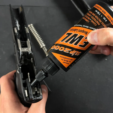 סט חומר ניקוי ושמן נשק Slip 2000 EWL Buddy Pack - Made in USA
